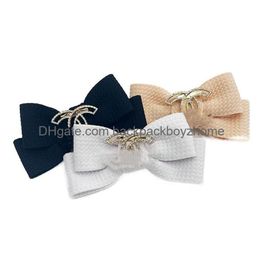 Designer Dog Hair Bow avec un motif de lettre classique luxueux chiot de chiot