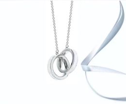 Designer double anneau pendentif personnalisé hip-hop collier mode haute qualité accessoires couple chaîne hommes et femmes couples accessoires pendentif