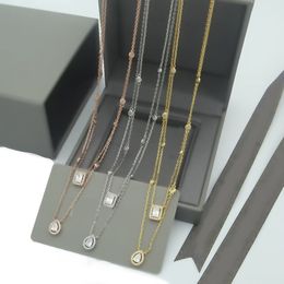 Designer double collier intelligent carré diamant goutte frange haute qualité corps entier zircon n'est pas allergique à la clavicule de luxe légère