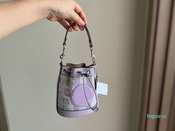 Diseñador de bolsos con cordón Señoras de lujo Mini Delicado Lindo Bolso de cubo Taro Púrpura Bolso de mano Cartera de cuero genuino suave Monedero Bolso de moda para mujer