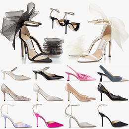 Chaussures habillées Designer 100 85 65 Mules Crystal Strap Pumps London High Heels Luxury Women Wedding Shoes Bow Noir Rose Rouge Suede Talon Hauteur Sandales Party