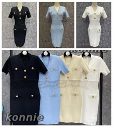 Robe de créatrice jupe robe femme 24ss jupe de design classique boutons en métaux à manches courtes de haute qualité jupe de taille de luxe de la taille