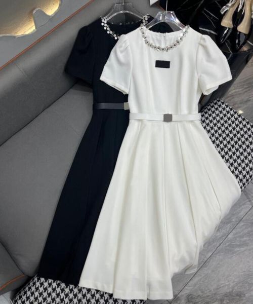 Robes de créateurs Été Nouvelle Mode Lettre Imprimer Jupe Col Rond Manches Courtes Slim Fit Wrap Robe De Hanche American Womens Vêtements Noir Blanc