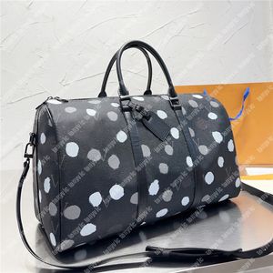 Designer plunjezakken voor heren Merk luxe reistas Graffiti Womens Luxurys Designer Bags Grote capaciteit Echte lederen tas Modebagage