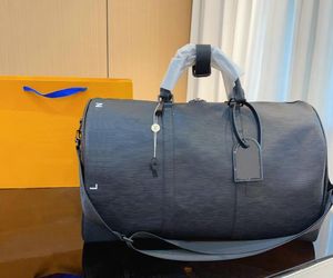 Sacs Duffel de créateurs grands sacs de bagages sacs de sac de voyage avec sac à bandoulière Lock Women 50 cm Sac à main de luxe en cuir surdimensionné