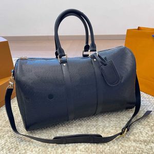 Designer Duffle Bag Classic Travel Bagage voor mannen Echt lederen Grote capaciteit Handtas Tages Schoudertassen Heren Dames Grote capaciteit Reistas 240415