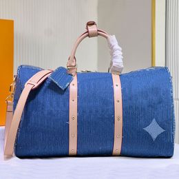 Designer plunjezak Luxe tas Denim draagtas Bagagetas Keepall tas Weekendtas Designer schoudertas Hoge kwaliteit handtassen met rits Gouden hardware Leren band