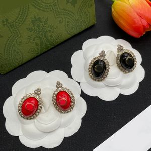 Boucles d'oreilles Designer Lettre en cuivre classique G charme Red Black acrylique Gem Stumps d'oreilles 18K Gol