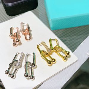 Pendientes de diseñador Elegante T Crystal U Rings Pendientes de encanto de 18K S925 Sterling Plate Plated Hoop Clip Pendientes para mujeres Accesorios de joyería de moda
