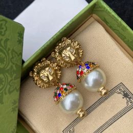 Pendientes de diseñador para mujer Pendiente de moda Cabeza de león Diamante Stud Ear Cuff Joyería Letra de lujo Pendiente de aro de oro Stud