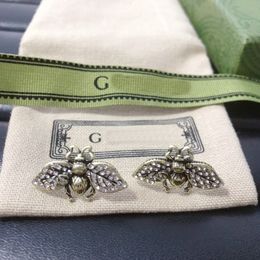 Pendientes de diseño Joyería Mujeres Pendientes de abeja de lujo Marca de moda Para mujer Studs 18K Chapado en oro Carta Pendiente de perla Regalo del banquete de boda