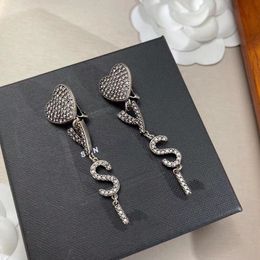 Boucles d'oreilles design luxe romantique plein de diamants boucles d'oreilles d'amour dames lettres tempérament exagéré boucles d'oreilles longues attrayantes