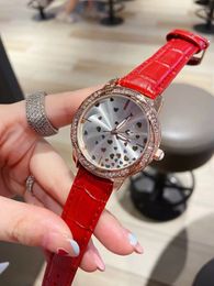 Diseñador caro de alta calidad con diamantes incrustados amor dial cuarzo reloj de mujer agente de fábrica reloj de lucha libre reloj señora limpio