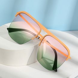 Gafas de diseño, tendencia de moda, lentes de alta definición, gafas de sol sin marco, campo de visión simple, cómodo, atmosférico y claro.