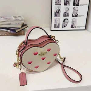 Logo classique sac pour femmes mignons sac de messager à rayures coeur nouveau nouveau sac d'amour presbyte sac féminin wangwang898