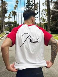 Designer Fashion Clothing Tees Hip hop TShirts Marque à la mode Rhude Broderie Couture Contraste Couleur Brouillard High Street T-shirt Couples pour hommes en été Demi-manches