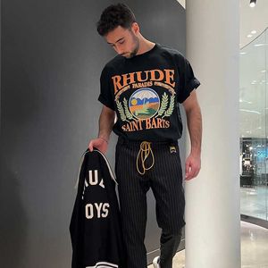 Designer Fashion Abbigliamento Tees Hip hop Magliette Rhude American Trend Brand Summer Vacation Beach Vintage Couple Vtg High Street Maglietta allentata Uomo Loose Streetwear