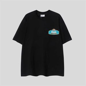 Vêtements de créateurs de mode T-shirts T-shirts Rhude Tiffany T-shirt en pur coton imprimé de couleur assortie Hommes Street Handsome Handsome Short Sleeve Half Sleeve Tops Streetwear