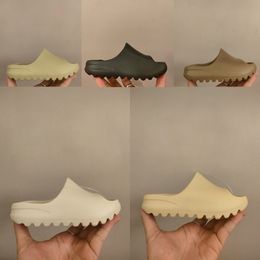 Diseñador moda eva kan toboganes niños pequeños bebés niños sandalias de tobogán zapatillas blancas sandalias de resina de hueso de arena blanca