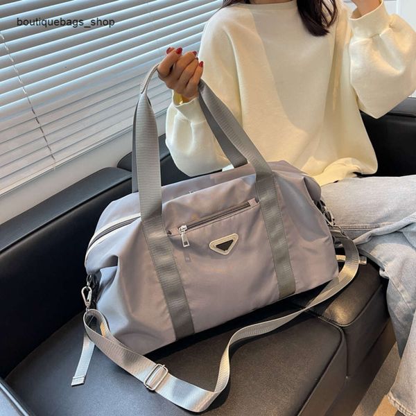 Sac à main de styliste pour femmes, sac de voyage célèbre, grande capacité, couleur, bagage à main, marque tendance, à la mode et