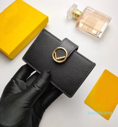Créateur de mode porte-monnaie en cuir mode portefeuille femmes hommes Mini porte-cartes de crédit en relief et motif dessiné à la main