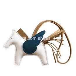 Designer Fashion Horse Zmmode S 10 cm de luxe en peau de mouton porte-clés en cuir véritable charme marque femmes sac ornement pendentif à la main Tre Dhkmi