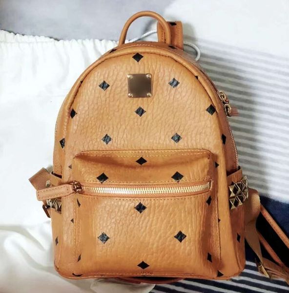 Designer de mode de luxe MC 3 tailles Sacs à dos Femmes Mini sac d'école en cuir véritable Grand sac à dos Sac à main Sacs de livre Embrayage Fourre-tout Épaule Hommes Crossbody Mochila