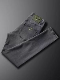 Jeans pour hommes de mode de créateur imprimé lettre triangle rétro nouveaux jeans lâche stretch lavage droit résistant à l'usure pantalons décontractés de sport
