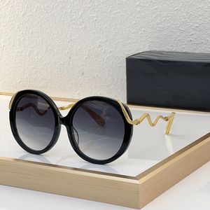 Lunettes de soleil de mode de créateurs Cadre acétate de lentilles rondes à la mode avec des jambes de lentilles incurvées C004M