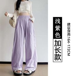 Pantalon évasé évasé designer Femmes Summer 2024 Nouveau pantalon décontracté paresseux plissé