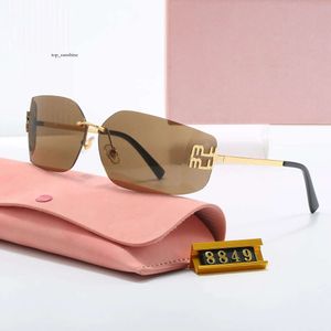 Designer pour femmes Lunettes de soleil sans cadre belles verres simples et élégants lentilles incurvées de style européen américain pare-brise pour femmes nuances