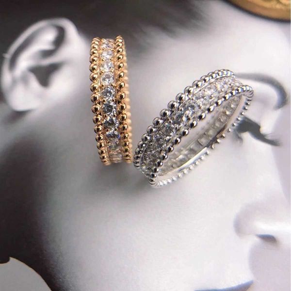Diseñador Clover de cuatro hojas Accesorios de joyería de lujo para mujeres Cleef Kaleidoscope Boaded Diamond Full Diamond V Grosor de oro 18K Anillos de estrellas brillantes exquisitos