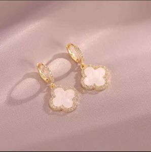 Boucles d'oreilles de styliste à quatre feuilles pour femmes, classiques, petit vent parfumé, trèfle, lumière dorée, Flash