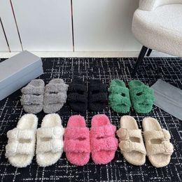 Diapositivas de piel de diseñador Sandalia de lana de goma para mujer Zapatillas peludas de peluche Piel de oveja Zapatos de nieve suaves y esponjosos con caja NO470