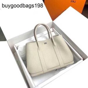 Sacs de fête de jardin de créateurs yijinyuan 2024 sac 30cm 36cm en cuir d'origine patchwork de shopping complet pour femmes portables ont le logo fpu8