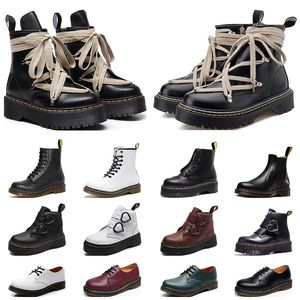 2024 Martins Botas de diseñador para mujer Martin Hombres Zapatillas de deporte de lujo Triple Negro Blanco Tobillo clásico Botines cortos Manténgase al aire libre Entrenadores cálidos