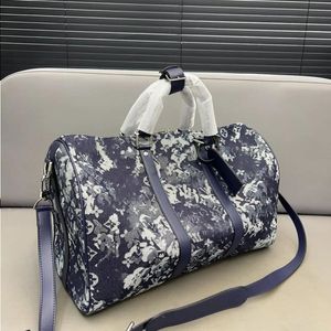 Designer en cuir authentique en cuir extérieur sac de voyage pour femmes marque de luxe unisexe sacs camouflage denim lettre brodée UEUAM