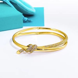 Designer Gold boog armband Women verpakking roestvrijstalen strengen ketting op handpaar geschenken voor vriendin accessoires groothandel sieraden