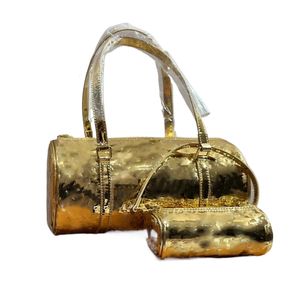 Bolso tote cilíndrico pequeño de cuero brillante dorado y plateado de diseñador