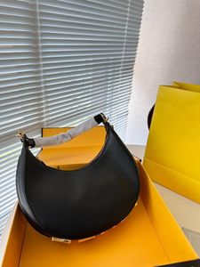 Diseñador Graphy Bolsos de media luna de cuero genuino Bolsos Bolso de muñeca con letras doradas inferiores Cadenas Correas Bolsos de hombro Bolsos de mano Bolsos de mujer Grandes 25 CM