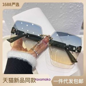 Designer H home lunettes de soleil originales à vendre printemps 2023 nouvelle tendance hommes et femmes sans cadre 7710 avec boîte-cadeau