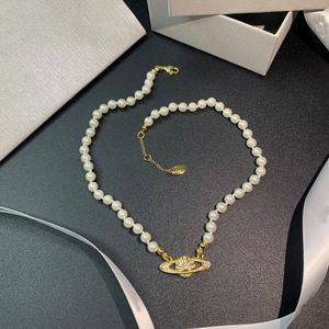 Ontwerper Halskette Frauen Luxusschmuck Perlen Halskette Voller Diamanten Saturn -planeet Perlen Halskette Vielsitige Leichte Luste Luxurise Schlsselbein Halskette