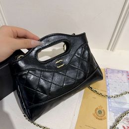 Diseñador Handbag Factory Promotion New Mini Horizontal Lindo Bag Oil Wax Light Luxury Textura de lujo