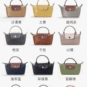 Sac à main deigner French Bun Mini Dumpling Bun Single Handle Mini Mobig Mobile Sac Mobile Sac en nylon Sac Sac pour femmes