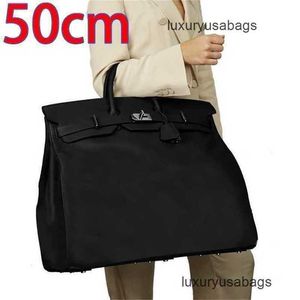 Sac à main designer Fashion 50 cm sacs sacs de voyage sac de voyage grande capacité sac de voyage en cuir Dominering Men's Sac WN-4SNX
