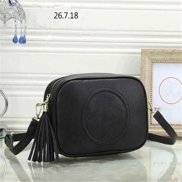 Bolsos de diseñador para mujer Bolsos de hombro Bolsos de moda Bolso de cámara de cuero genuino Bolso bandolera de diseñador Bolso de cámara Monedero Bolso de noche con borla