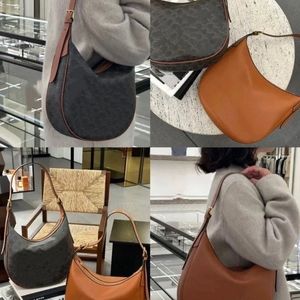 Bolsos de diseñador Cuero suave Heloise Bolsos de hombro Estampado icónico Flor de lujo Mujeres Hombres Bolsa de compras de fin de semana Cremallera con correa Cartera grande Bolsos de mano