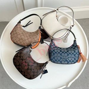 Bolsos de diseñador Bolso de hombro para axilas Paquete de mujer Bolso de pecho de lujo Hombro de cuero Bolso suelto chino callejero Patrón Monedero Bolso cosmético