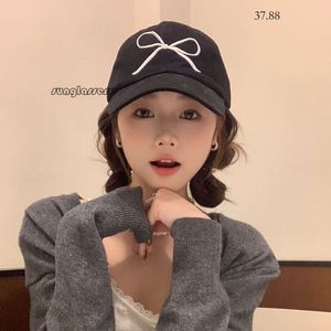 Cap de baseball coréen Instagram arc brodé de baseball de baseball féminin / été rose rose doux mignon top duck tong tongue chapeau couple de couple