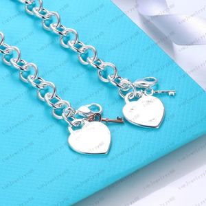 Bracelet clé en forme de coeur de concepteur femme collier en acier inoxydable couple chaîne en or pendentif cou bijoux de luxe accessoires cadeaux 270u